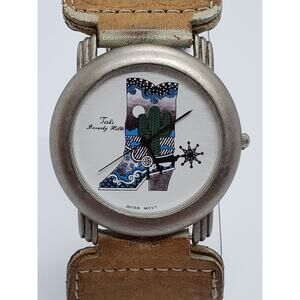 Tali Beverly Hill's women's watch. Women's cowboy boot on face. Working watch